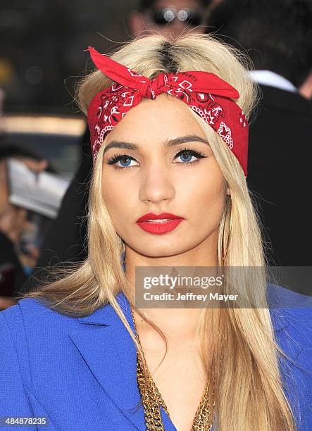 Singer Pia Mia Perez arrives at the Los Angeles premiere of 'Divergent' at Regency Bruin Theatre on March 18, 2014 in Los Angeles, California.