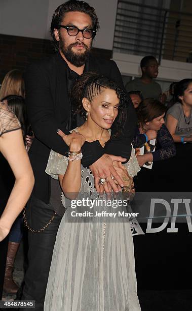Actors Lisa Bonet and Jason Momoa arrive at the Los Angeles premiere of 'Divergent' at Regency Bruin Theatre on March 18, 2014 in Los Angeles,...