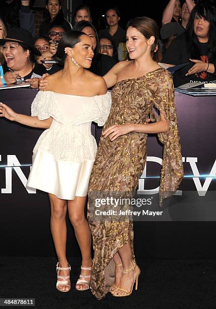 Actresses Zoe Kravitz and Shailene Woodley arrive at the Los Angeles premiere of 'Divergent' at Regency Bruin Theatre on March 18, 2014 in Los...