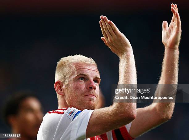 Davy Klaassen of Ajax applaudes the fans after victory in the UEFA Europa League play off round 1st leg match between Ajax Amsterdam and FK Baumit...