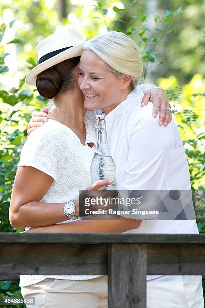 Crown Princess Victoria of Sweden and Crown Princess Mette-Marit of Norway take part in Climate Pilgrimage on August 22, 2015 in Halden, Norway.