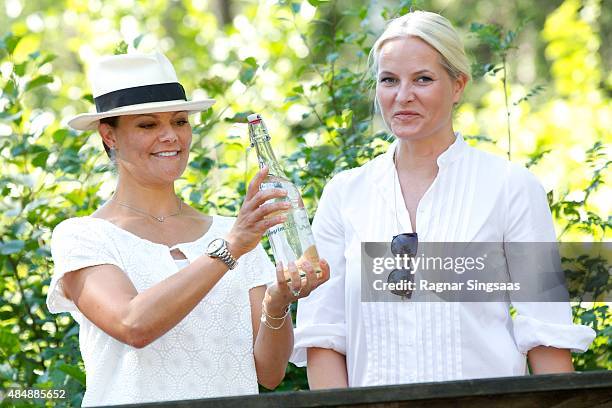 Crown Princess Victoria of Sweden and Crown Princess Mette-Marit of Norway take part in Climate Pilgrimage on August 22, 2015 in Halden, Norway.