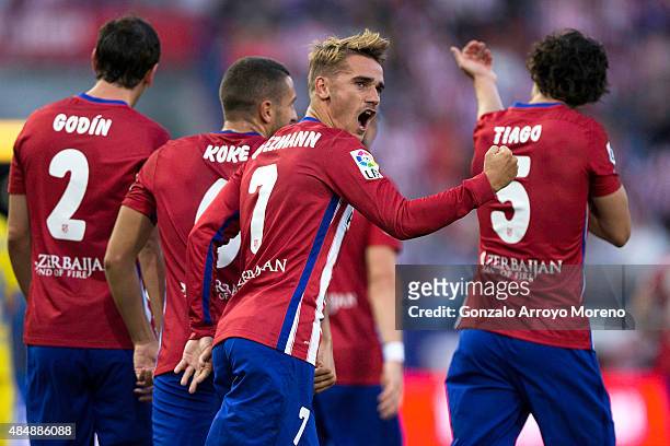 Antoine Griezmann of Atletico de Madrid celebrates scoring their opening goal during the La Liga match between Club Atletico de Madrid and UD Las...