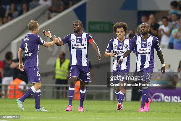Etienne Didot Jean Daniel Akpa Akpro Martin Braithwaite from of Toulouse FC celebrates the goal of Tongo Doumbia during the French Ligue 1 match...