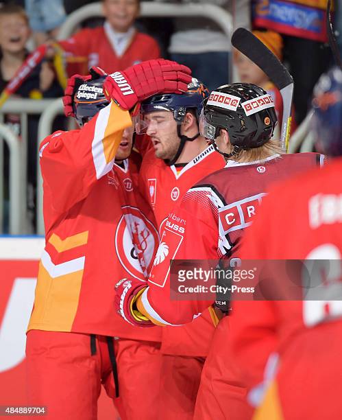 Team celebrates after scoring the 6:3 during the game between Duesseldorfer EG and Black Wings Linz on August 22, 2015 in Duesseldorf, Germany.