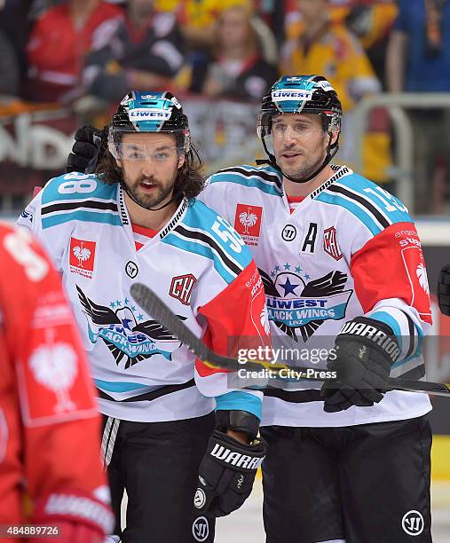 Sebastien Piche and Brett McLean of the Black Wings Linz celebrate after scoring the 0:1 during the game between Duesseldorfer EG and Black Wings...