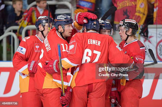 Team celebrates after scoring the 6:3 during the game between Duesseldorfer EG and Black Wings Linz on August 22, 2015 in Duesseldorf, Germany.