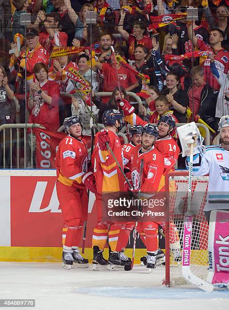 Team celebrates after scoring the 4:2 during the game between Duesseldorfer EG and Black Wings Linz on August 22, 2015 in Duesseldorf, Germany.