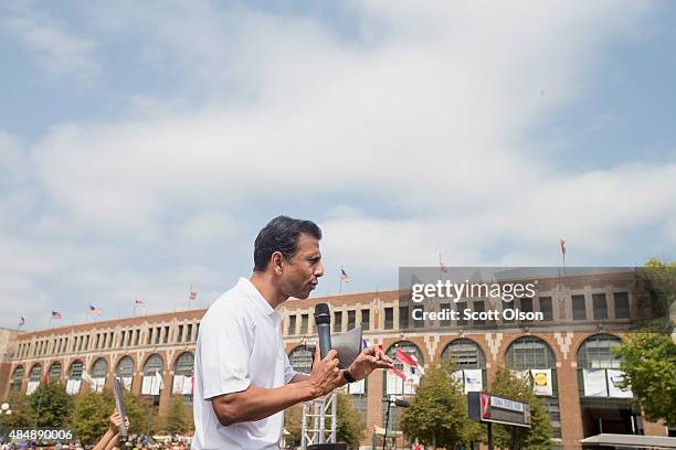 Republican presidential candidate Louisiana Governor Bobby Jindal speaks to visitors at the Iowa State Fair on August 22, 2015 in Des Moines, Iowa....