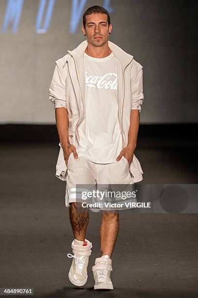 Model walks the runway during the Coca Cola Clothing Fashion show at Rio de Janeiro Fashion Week Spring Summer 2014/2015 on April 9, 2014 in Rio de...