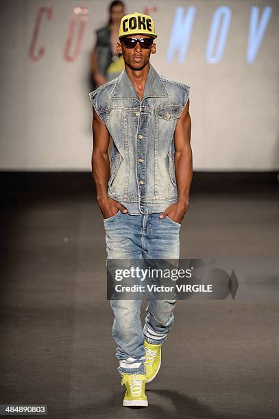 Model walks the runway during the Coca Cola Clothing Fashion show at Rio de Janeiro Fashion Week Spring Summer 2014/2015 on April 9, 2014 in Rio de...