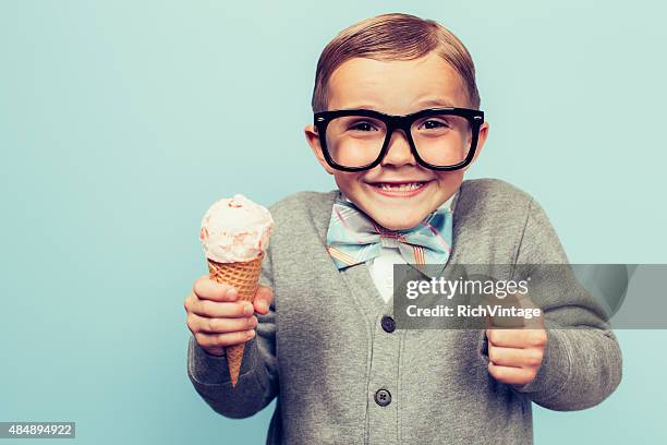 young nerd boy with ice cream cone - ice cream cone stockfoto's en -beelden