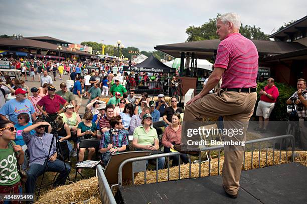 Mark Everson, former commissioner of the U.S. Internal Revenue Service and 2016 Republican presidential candidate, listens to an attendee at the Iowa...