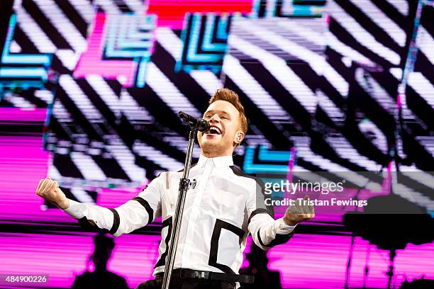 Olly Murs performs on Day 1 of the V Festival at Hylands Park on August 22, 2015 in Chelmsford, England.