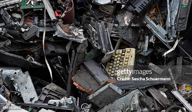 Electronic components including circuit boards sit in a pile ahead of recycling at Aurubis AG on February 7, 2014 in Luenen, Germany. Aurubis is...