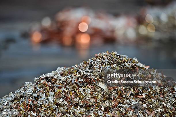 Electronic components including circuit boards sit in a pile ahead of recycling at Aurubis AG on February 7, 2014 in Luenen, Germany. Aurubis is...