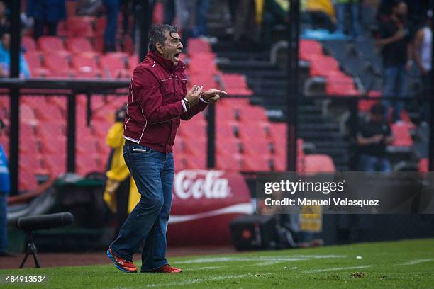 Carlos Reinoso, coach of Veracruz reacts during a 6th round match between America and Veracruz as part of Apertura 2015 Liga MX at Azteca Stadium on...