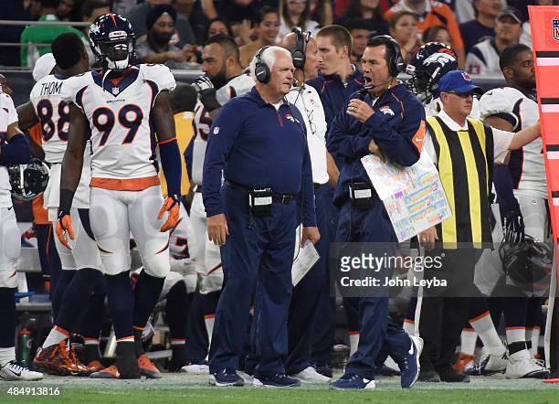 Denver Broncos head coach Gary Kubiak yells down the sidelines during the second quarter against the Houston Texans August 22, 2015 at NRG Stadium.