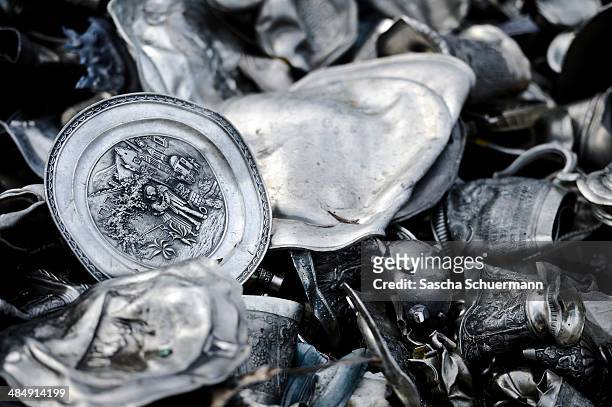 Scrap consisting of tin plates and cups lie in a heap before being melted down at the Aurubis recycling smelter on April 14, 2014 in Luenen, Germany....