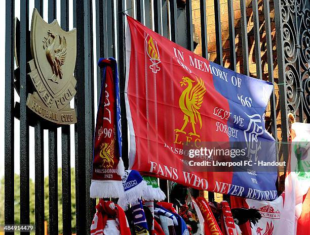 In this handout image provided by Liverpool FC, football scarves and tributes are placed at the Hillsborough memorial during the memorial service...