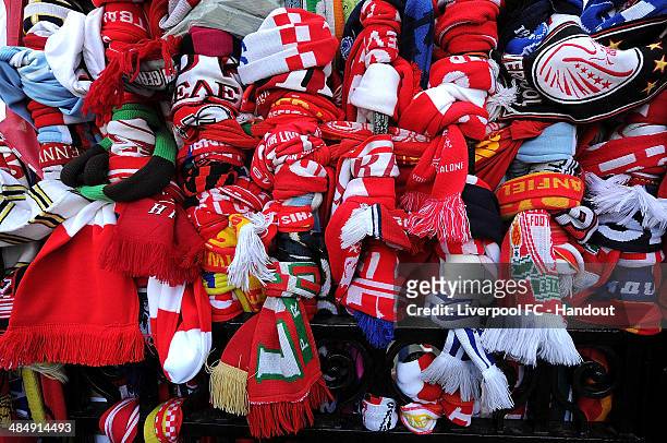 In this handout image provided by Liverpool FC, football scarves and tributes are placed at the Hillsborough memorial during the memorial service...