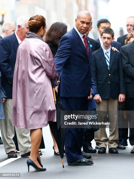 Massachusetts Governor Deval Patrick walks with his wife, Diane, and members of the victims families during a wreath-laying ceremony commemorating...