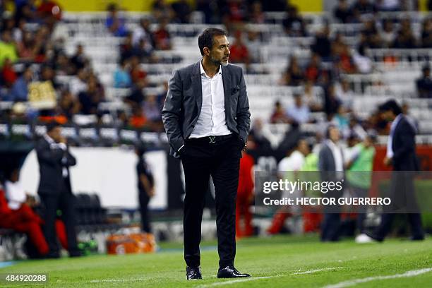 Atlas' coach Gustavo Matosas looks on during their Mexican Apertura 2015 tournament football match against Toluca at Jalisco stadium on August 22,...