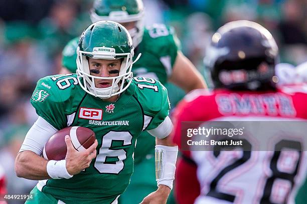 Brett Smith of the Saskatchewan Roughriders scrambles in a game between the Calgary Stampeders and Saskatchewan Roughriders in week 9 of the 2015 CFL...