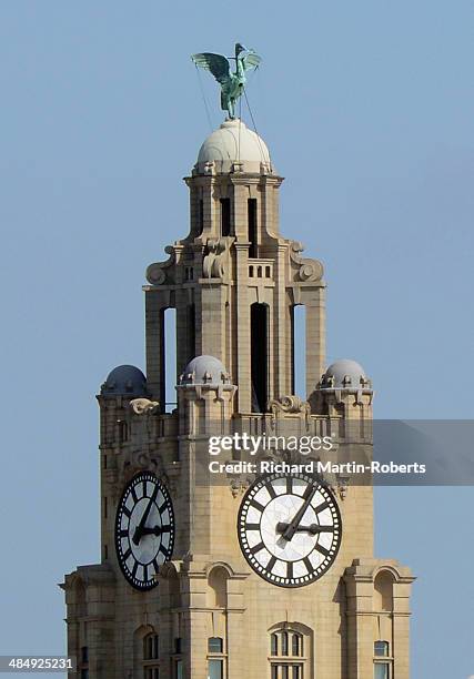 The hands of the clocks on the tower of the Liver Building strike 15:06, as a minutes silence is observed across the City to mark the 25th...