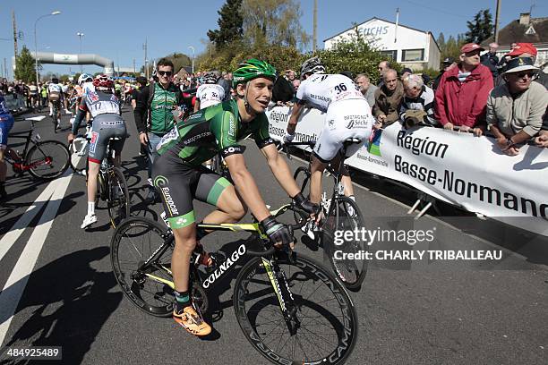 Europcar team's Bryan Coquard of France, smiles after crossing the finish line to win the 75th edition of the Paris-Camembert cycling race on April...