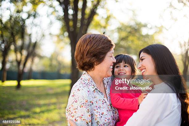 hispanic family - hispanic grandmother stock pictures, royalty-free photos & images