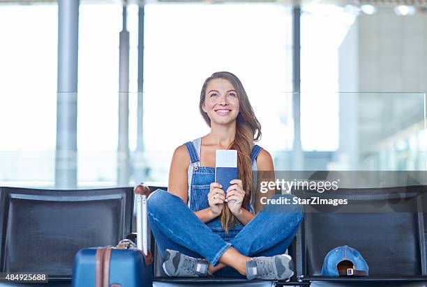 i can't wait to get on that plane! - woman excited sitting chair stock pictures, royalty-free photos & images