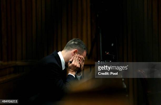 Oscar Pistorius listens to evidence in the Pretoria High Court on April 15 in Pretoria, South Africa. Oscar Pistorius stands accused of the murder of...