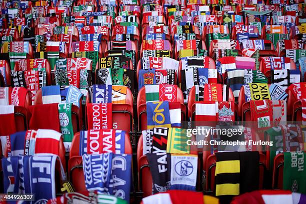 Scarves donated by fans of Liverpool and teams across the world are placed on empty seats during the memorial service marking the 25th anniversary of...