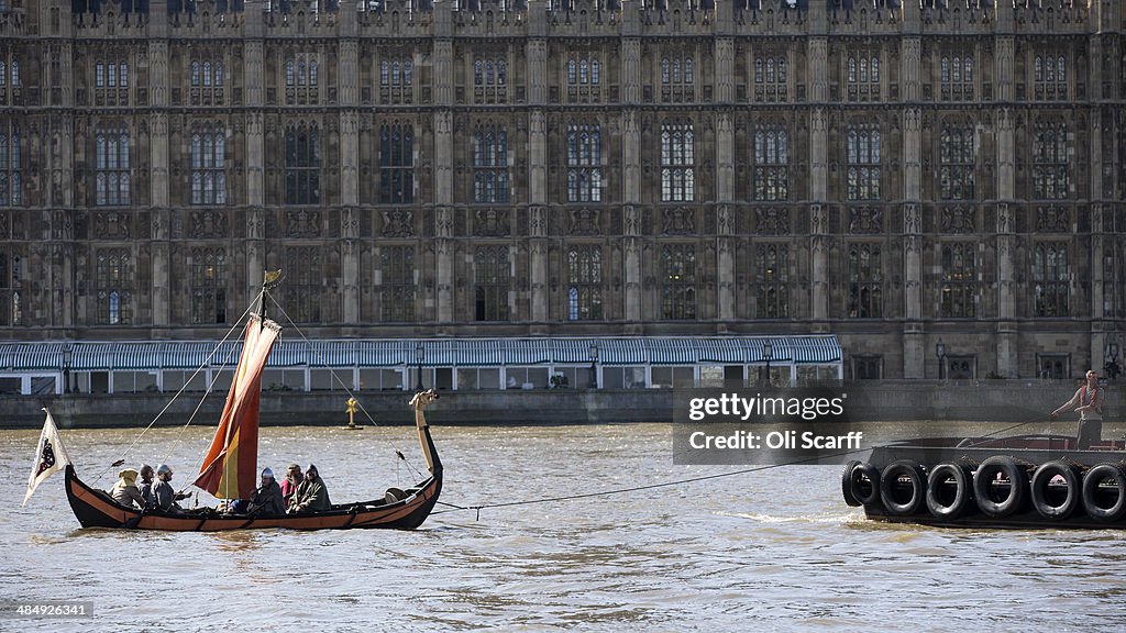 Viking Boat Sails Past Houses Of Parliament