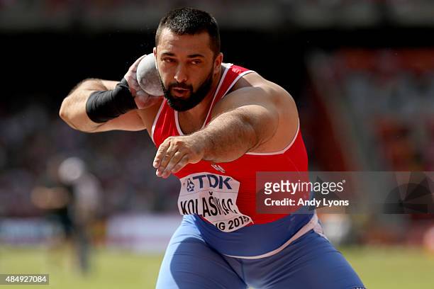 Asmir Kolasinac of Serbia competes in the Men's Shot Put qualification during day two of the 15th IAAF World Athletics Championships Beijing 2015 at...