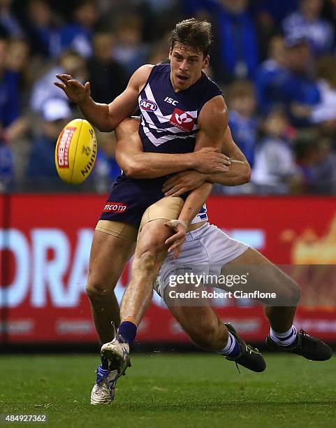 Nick Suban of the Dockers kicks the ball during the round 21 AFL match between the North Melbourne Kangaroos and the Fremantle Dockers at Etihad...