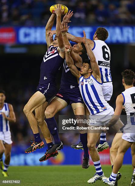 Alex Pearce of the Dockers attemps to mark during the round 21 AFL match between the North Melbourne Kangaroos and the Fremantle Dockers at Etihad...