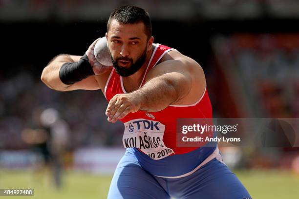 Asmir Kolasinac of Serbia competes in the Men's Shot Put qualification during day two of the 15th IAAF World Athletics Championships Beijing 2015 at...