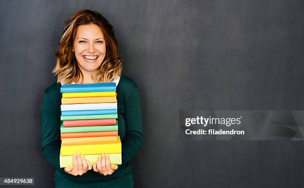 back to school - teacher with folder stock pictures, royalty-free photos & images