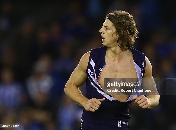 Nat Fyfe of the Dockers is seen after his shirt was ripped during the round 21 AFL match between the North Melbourne Kangaroos and the Fremantle...