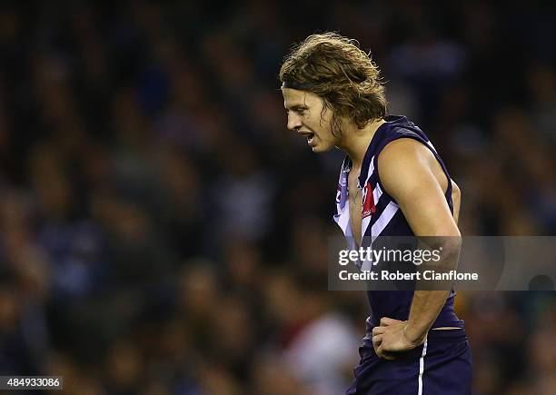 Nat Fyfe of the Dockers is seen after his shirt was ripped during the round 21 AFL match between the North Melbourne Kangaroos and the Fremantle...
