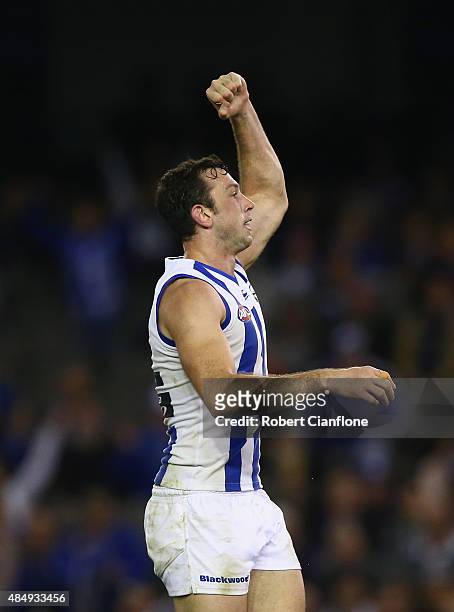 Todd Goldstein of the Kangaroos celebrates after scoring a goal during the round 21 AFL match between the North Melbourne Kangaroos and the Fremantle...