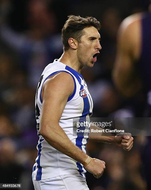 Jarrad Waite of the Kangaroos celebrates after scoring a goal during the round 21 AFL match between the North Melbourne Kangaroos and the Fremantle...