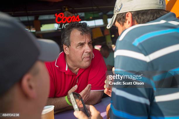 Republican presidential candidate New Jersey Governor Chris Christie greets visitors at the Iowa State Fair on August 22, 2015 in Des Moines, Iowa....