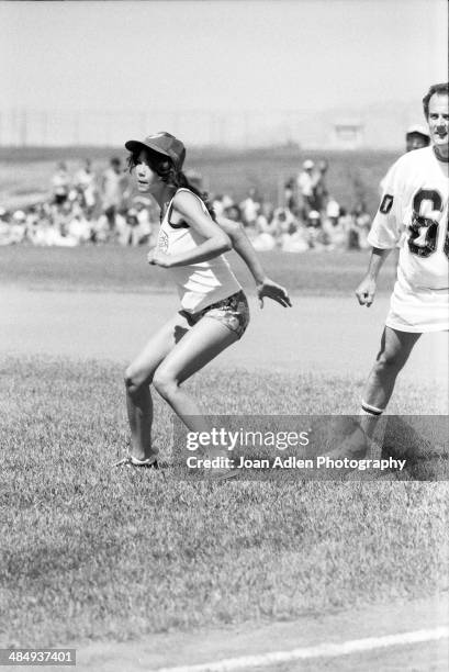 Model, actress and singer Barbi Benton ready to steal base at the Kenny Rogers Golden Nugget celebrity softball game to aid the Nevada Special...