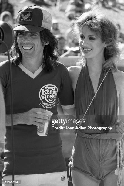 Singer, songwriter and musician Alice Cooper with his wife dancer Sheryl Goddard attend the Kenny Rogers Golden Nugget celebrity softball game to aid...