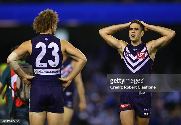 Chris Mayne and Stephen Hill of the Dockers look dejected after the Dockers were defeated by the Kangaroos during the round 21 AFL match between the...