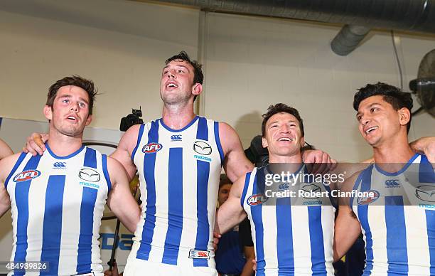 The Kanagroos celebrate after they defeated the Dockers during the round 21 AFL match between the North Melbourne Kangaroos and the Fremantle Dockers...