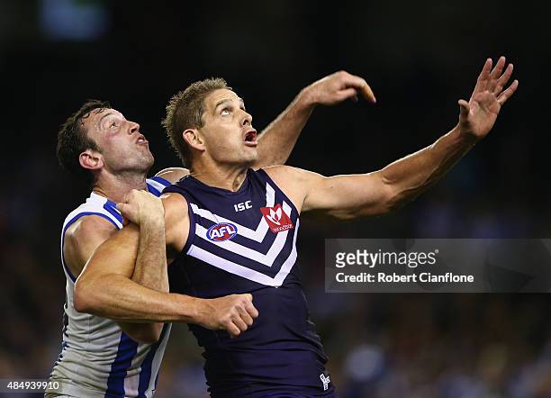Todd Goldstein of the Kangaroos and Aaron Sandilands of the Dockers compete for the ball during the round 21 AFL match between the North Melbourne...